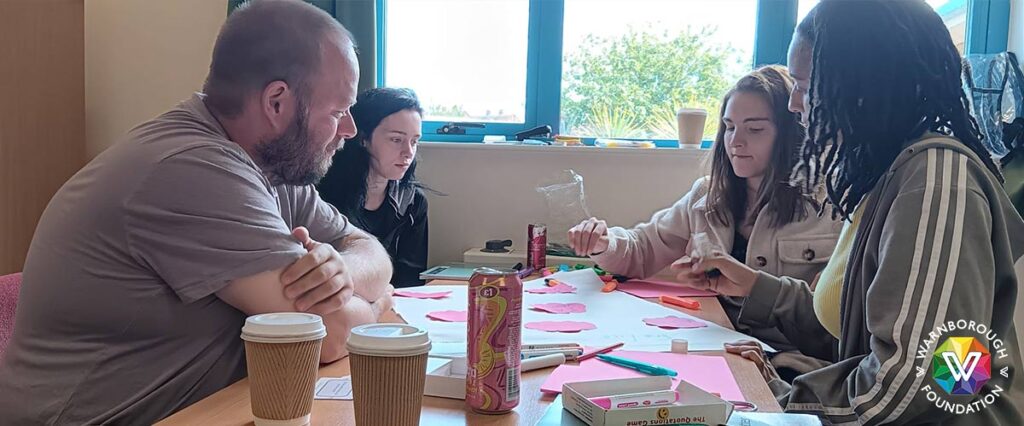 The group get together for a brainstorm session