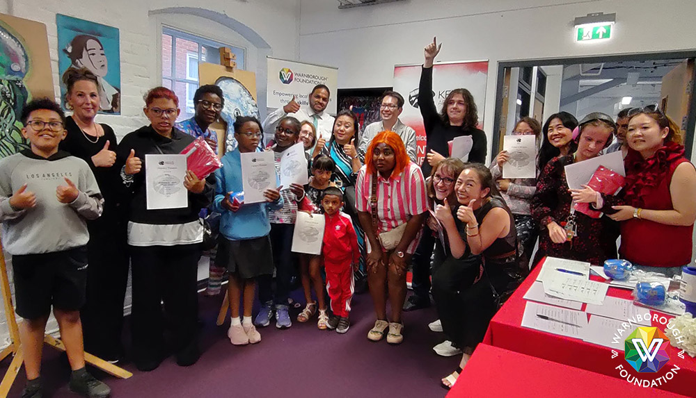 Cr Nina Gurung poses with all the school art competition participants and winners