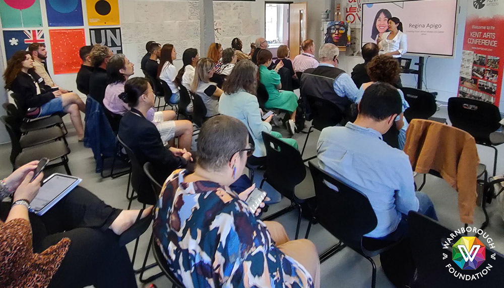 Regina Apigo does her presentation