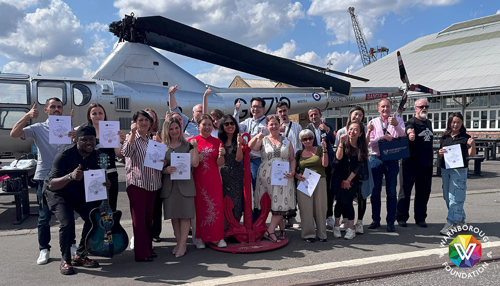 Obligatory group photo in front of the helicopter